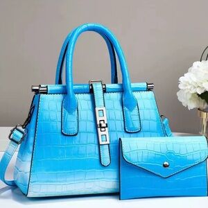 Luxury handbag with mini makeup bag